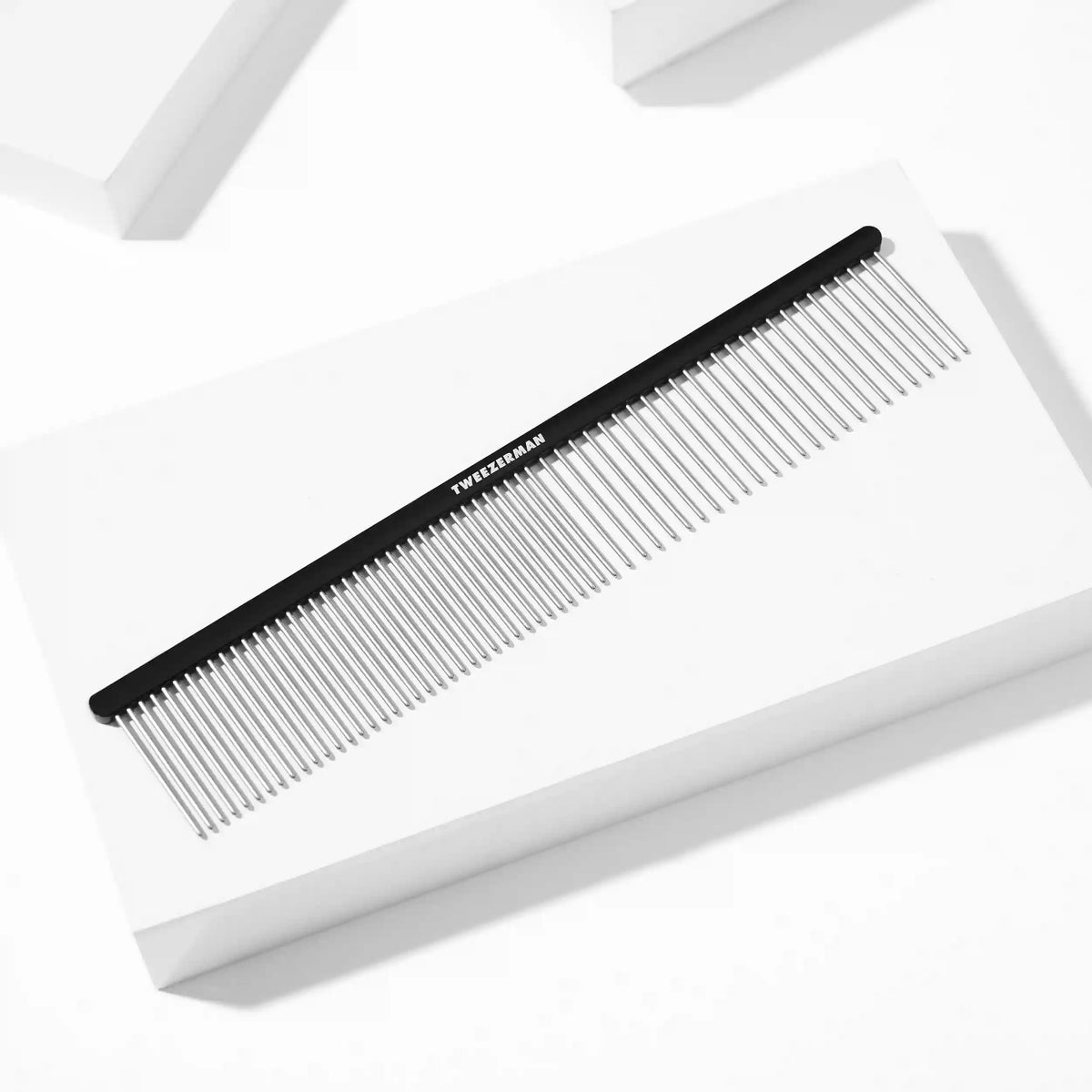 DUAL-SIDED DETANGLING COMB